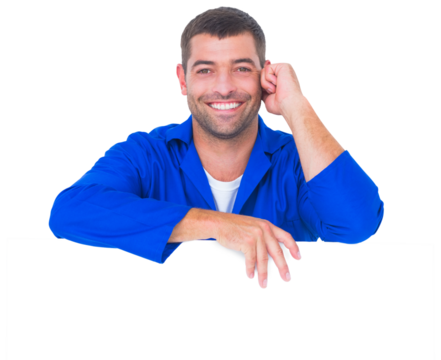 Handsome mechanic with blank placard