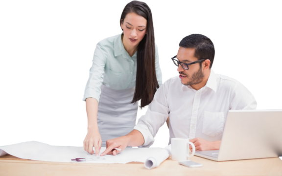 Casual architecture team working together at desk