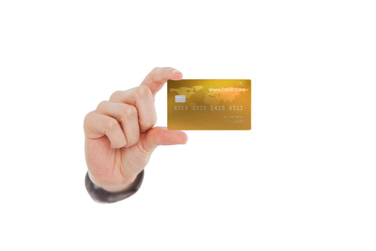 Cropped image of human hand showing bank credit card