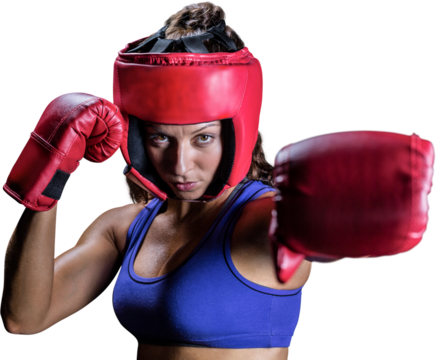 Portrait of female boxer with gloves and headgear
