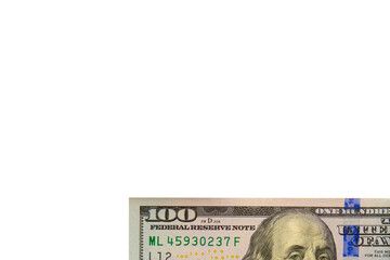 Close up detail of part of modern USD hundred dollar bill showing blue anti-counterfeit band, part...