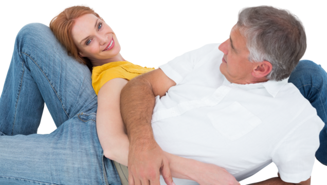 Casual couple lying on floor