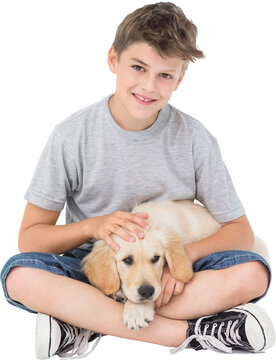 Boy sitting with dog 