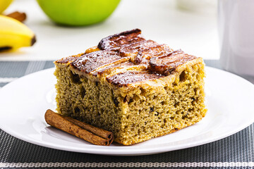 slice of vegan banana cake, organic, typical bakery cake in Brazil made with cinnamon and fruits, macro photography