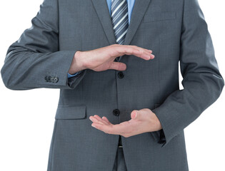 Mid section of businessman pretending to hold an object