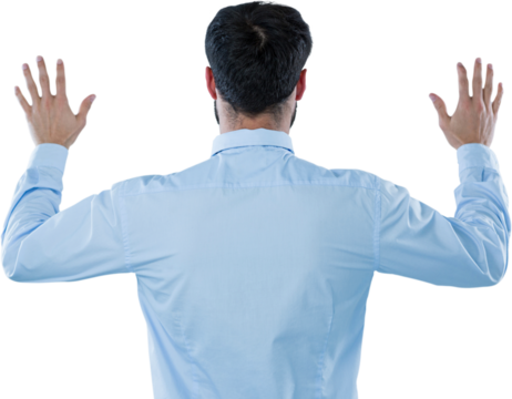 Rear view of entrepreneur pretending to use invisible screen - Powered by Adobe