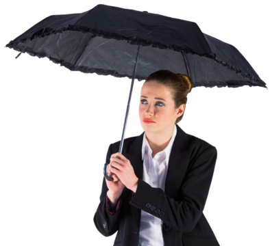 Businesswoman holding a black umbrella