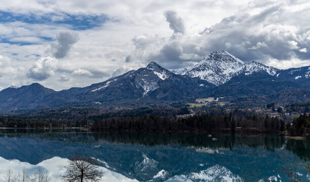 Spring on an Austrian lake Faakersee overlooking the Alps © Vlad