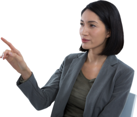 Businesswoman touching invisible screen