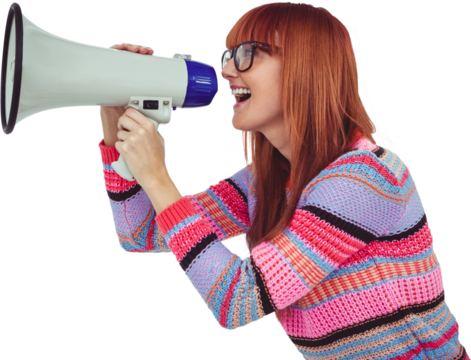 Smiling hipster woman shooting through megaphone