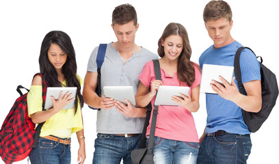 Obraz premium Students with backpacks looking at their tablets