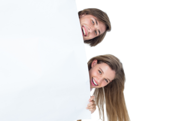 Hipster couple holding poster 