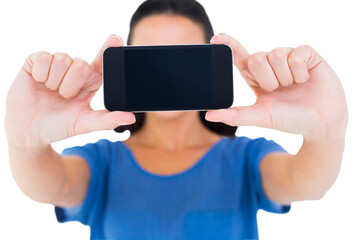 Pretty brunette taking a selfie