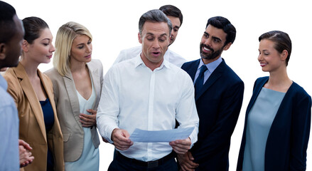 Businessman explaining blueprint to colleagues against white background