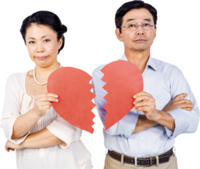 Couple holding broken heart