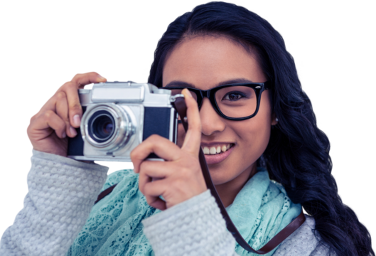 Asian woman taking picture with digital camera