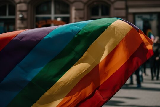 A rainbow falg waving in the wind, representing the diversity and inclusivity of the LGBTQ+ community made with Generative AI