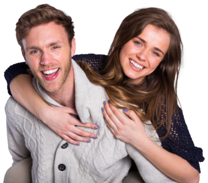 Smiling young man carrying woman