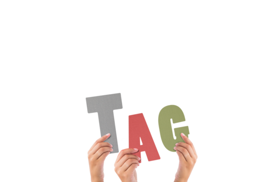 Colorful alphabet spelling tag held up by people 