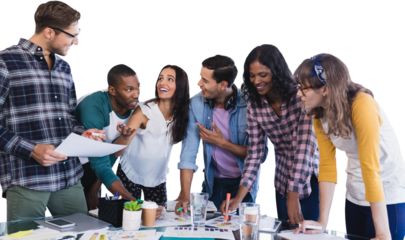 Smiling business people working at table