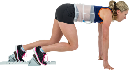 Female athlete in position ready to run