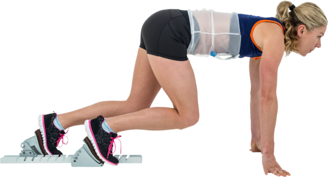 Female athlete in position ready to run