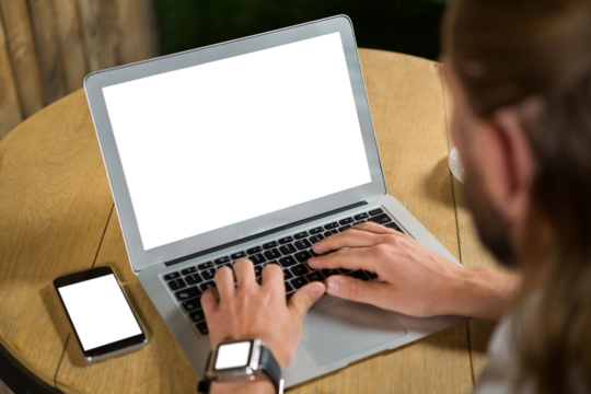 Cropped image of man using laptop