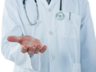Midsection of doctor gesturing