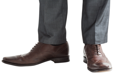Businessmans feet in brown brogues