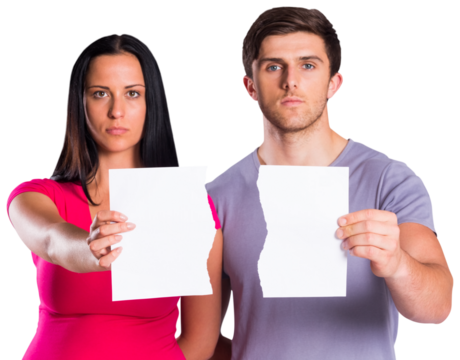 Couple showing broken piece of paper