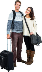 Portrait of cheerful couple in warm clothing with luggage
