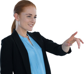 Smiling young businesswoman touching imaginary interface