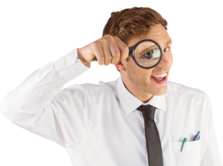 Geeky businessman looking through magnifying glass