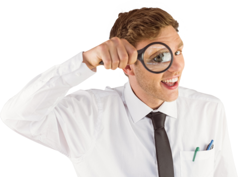 Geeky businessman looking through magnifying glass - Powered by Adobe