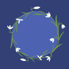 Round frame with snowdrops spring flowers on blue background, place for text, vector