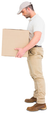 Side view of delivery man with cardboard box