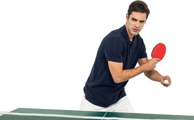 Confident male athlete playing table tennis