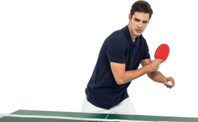 Confident male athlete playing table tennis