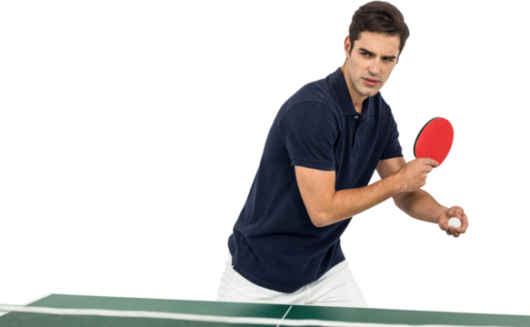 Confident male athlete playing table tennis