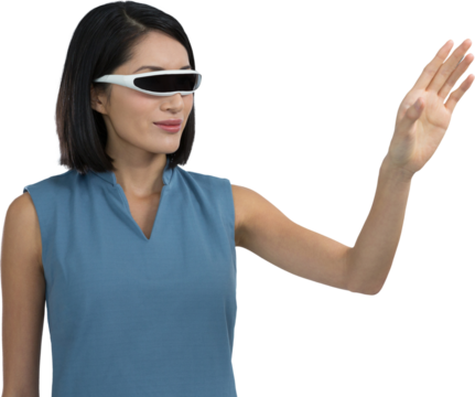 Female executive gesturing while using virtual reality headset