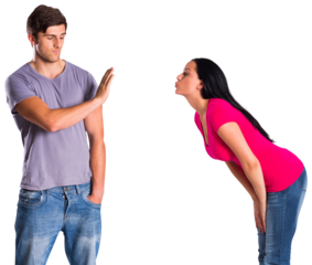 Man rebuffing the kiss of his girlfriend