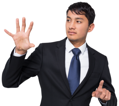 Unsmiling businessman holding and pointing