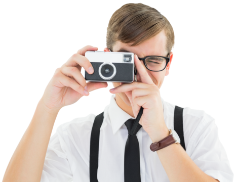 Geeky hipster holding a retro camera