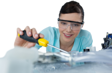 Female engineer repairing computer motherboard