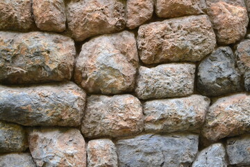 Detail of stone wall background texture, Inca wall in Cuzco, Peru