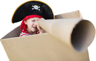 Boy in pirate hat holding artificial telescope