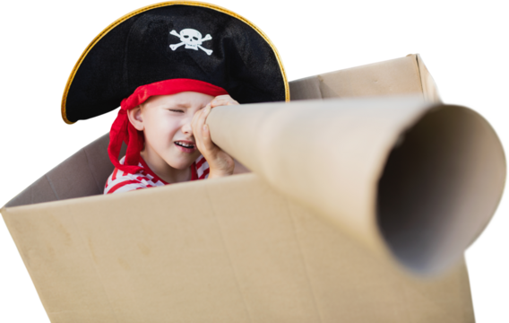 Boy in pirate hat holding artificial telescope