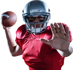 Portrait of sportsman defending while holding American football