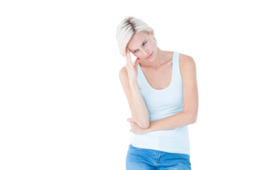 Depressed blonde woman with hand on temple 