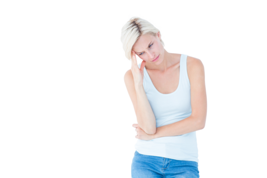 Depressed blonde woman with hand on temple - Powered by Adobe